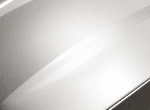 Shiny car hood reflecting sunlight with a subtle glowing protective film being applied, set against a bright, clean background.